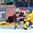 MOSCOW, RUSSIA - MAY 6: Sweden's Jimmie Ericsson #21 crashes into Latvia's Elvis Merzlikins #30 during preliminary round action at the 2016 IIHF Ice Hockey Championship. (Photo by Andre Ringuette/HHOF-IIHF Images)

